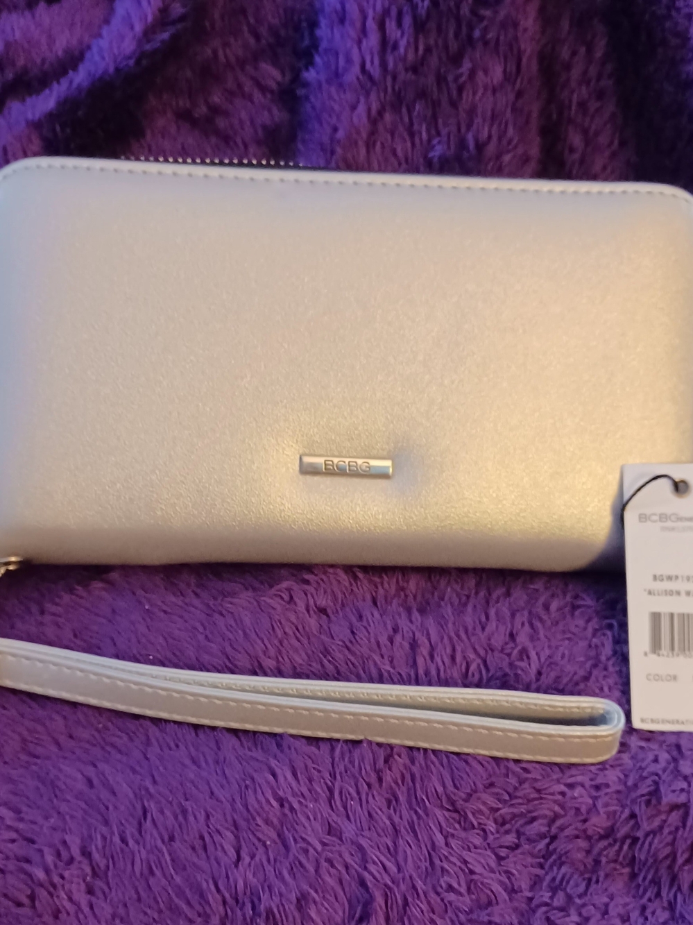 BCBGeneration Allison faux leather wallet with a removable wrist strap.